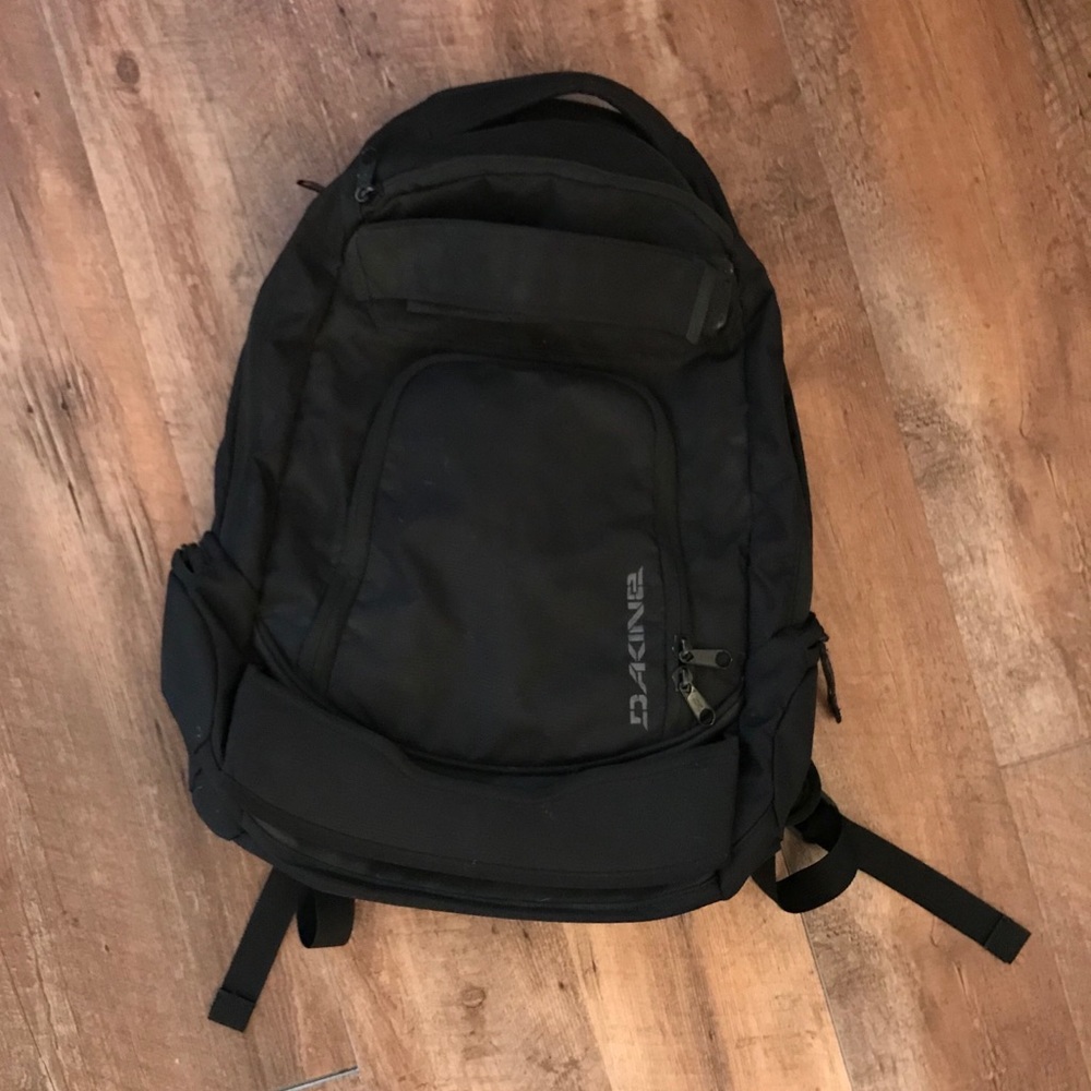 Black Dakine Backpack with Board Straps